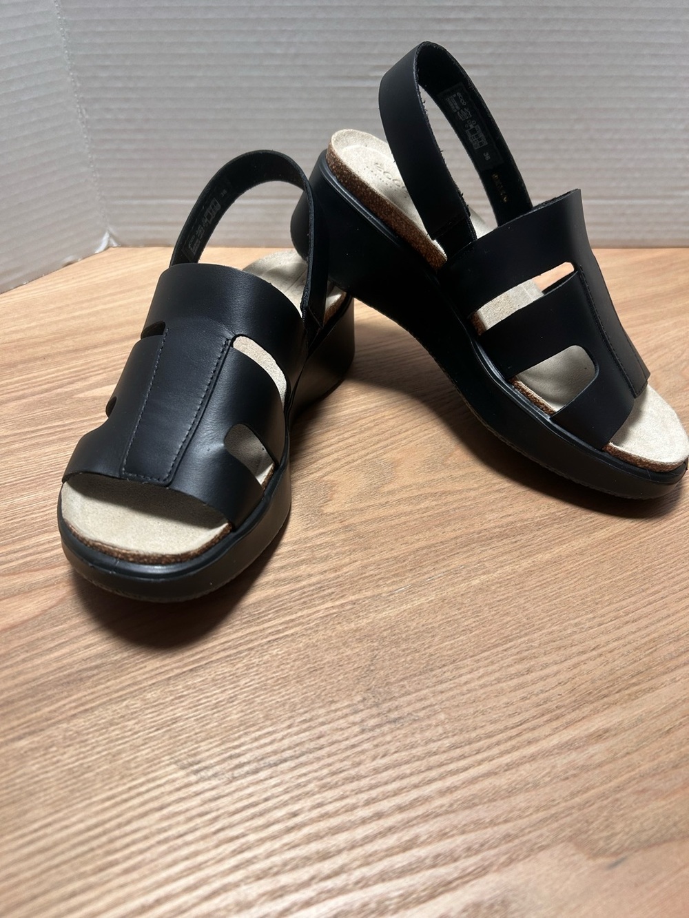 Ecco Black Leather Slingback Wedge Sandals with Cork-Textured Footbed.